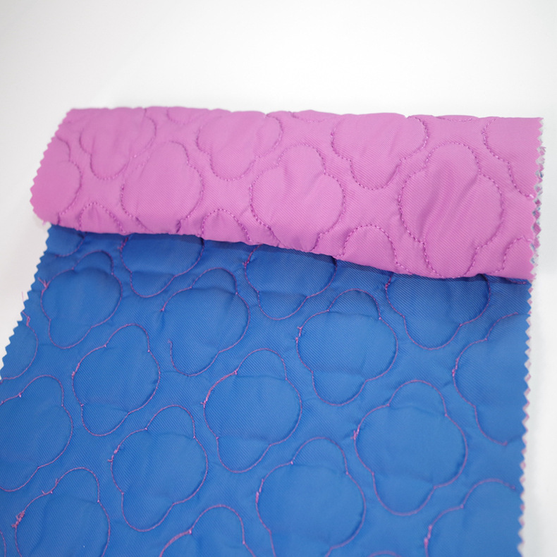 秋冬平纹双面梅花绗绣夹棉防火阻燃涤丝纺电脑绣花面料