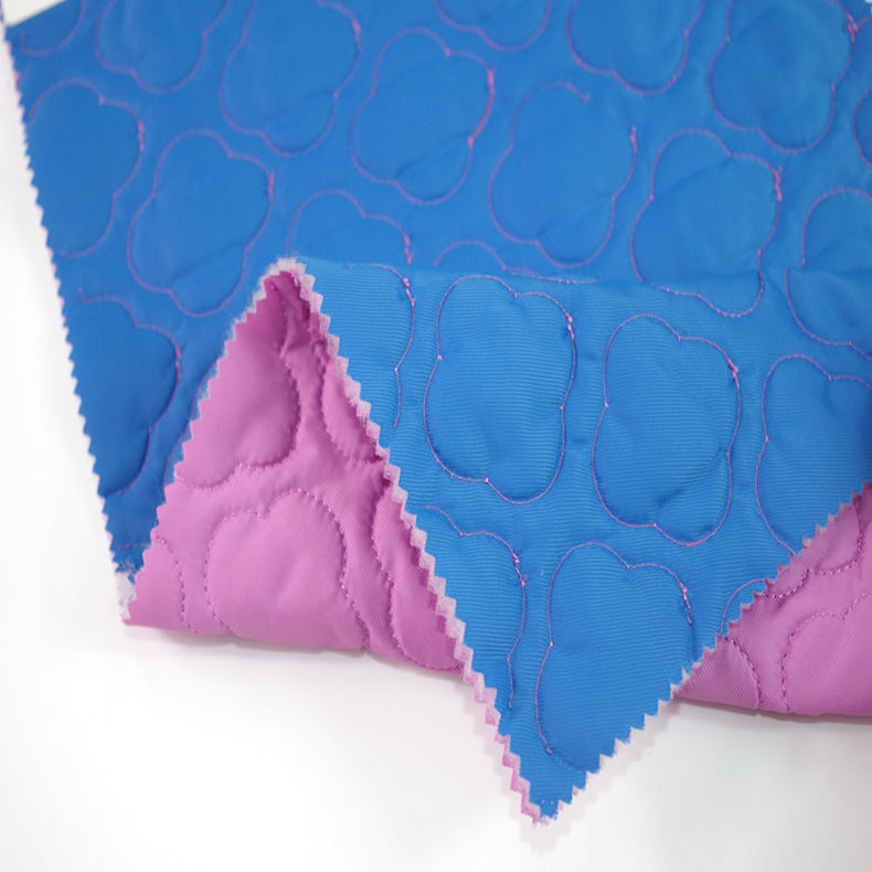 秋冬平纹双面梅花绗绣夹棉防火阻燃涤丝纺电脑绣花面料