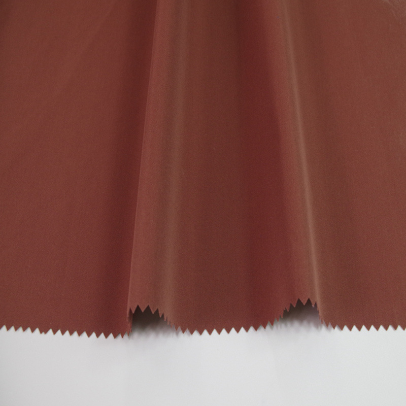 现货供应 全涤高品质面料 秋冬时装棉服羽绒服潮流布料防风