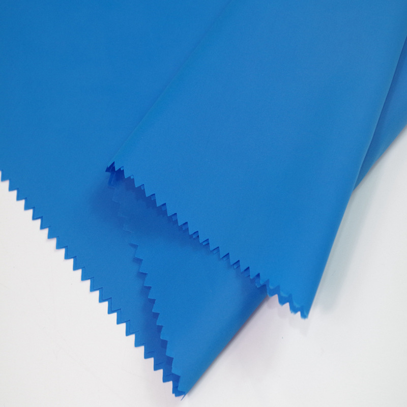 厂家现货供应高品质涤塔夫绸布料羽绒服里料服装印花素色全