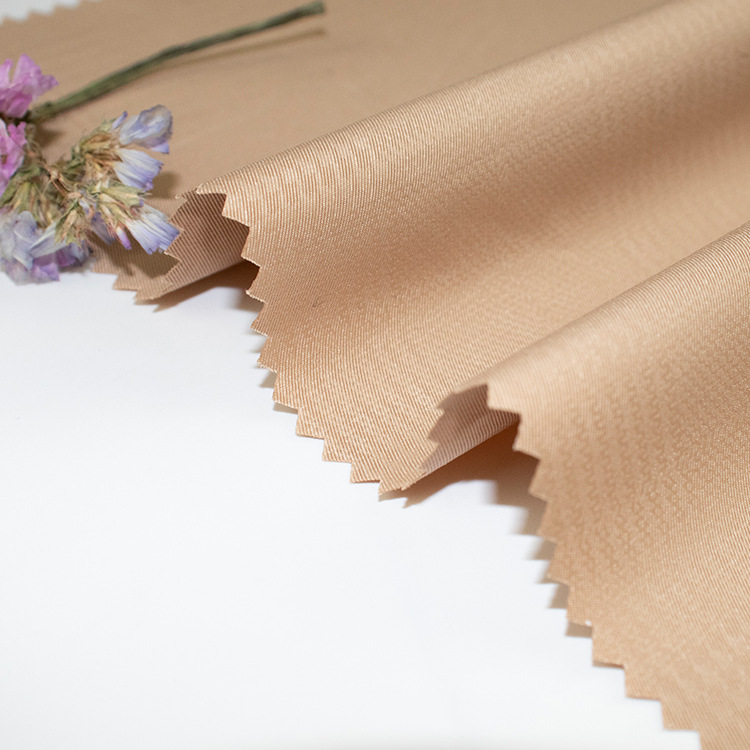 40d斜纹涂层面料 全涤风衣面料 春秋款服装涤纶面料 现货供应