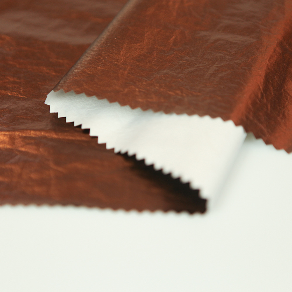 厂家直销 尼龙烫金面料 锦纶化纤秋冬风衣羽绒服布料服装辅料批发