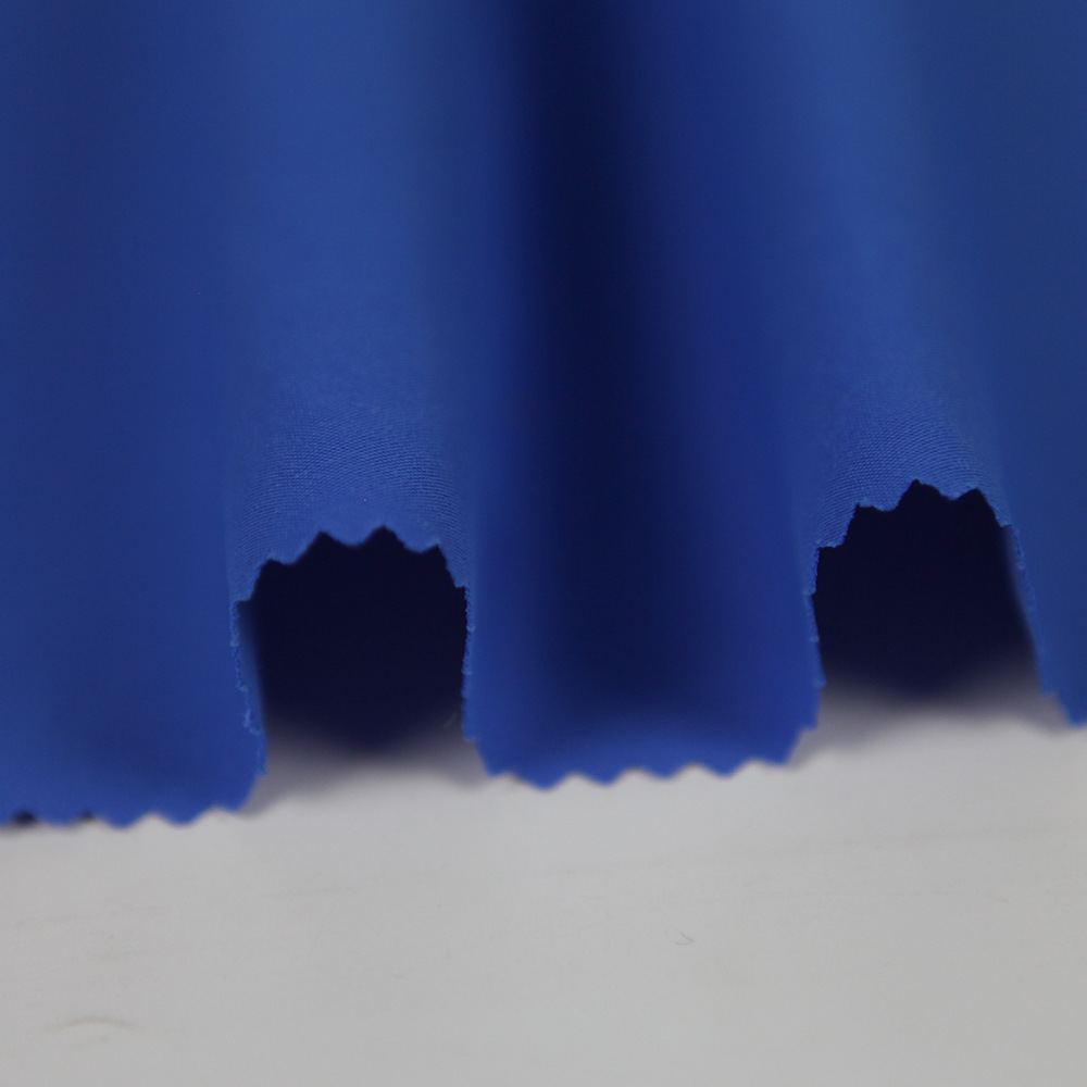 涤纶布仿棉面料150g秋冬季裤装上衣运动服羽绒服面料批发布料定制