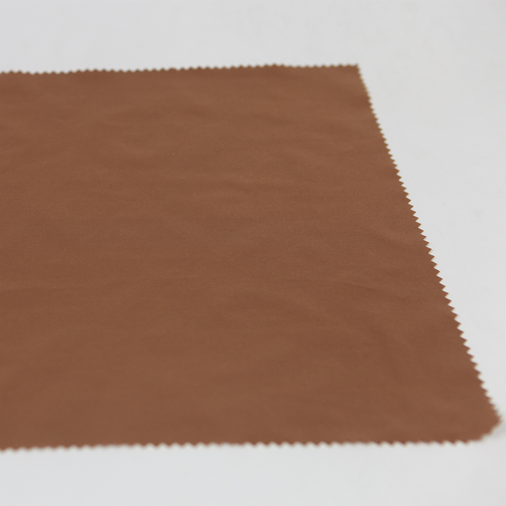 厂家直供全涤面料秋冬季上衣冲锋衣面料休闲服棉服羽绒服面料批发