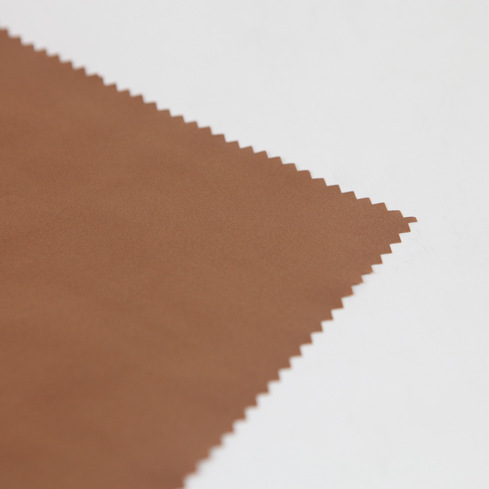 厂家直供全涤面料秋冬季上衣冲锋衣面料休闲服棉服羽绒服面料批发