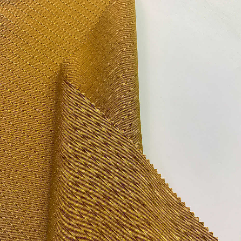 0.5cm正方格提花 棉服羽绒服裤装时装面料 秋冬涤纶面料 现货