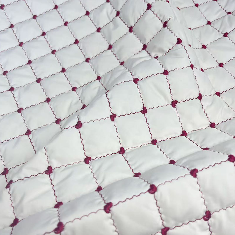 绗缝棉布料衍缝绗绣花面料云朵包绣花布料刺绣面料平绣服装