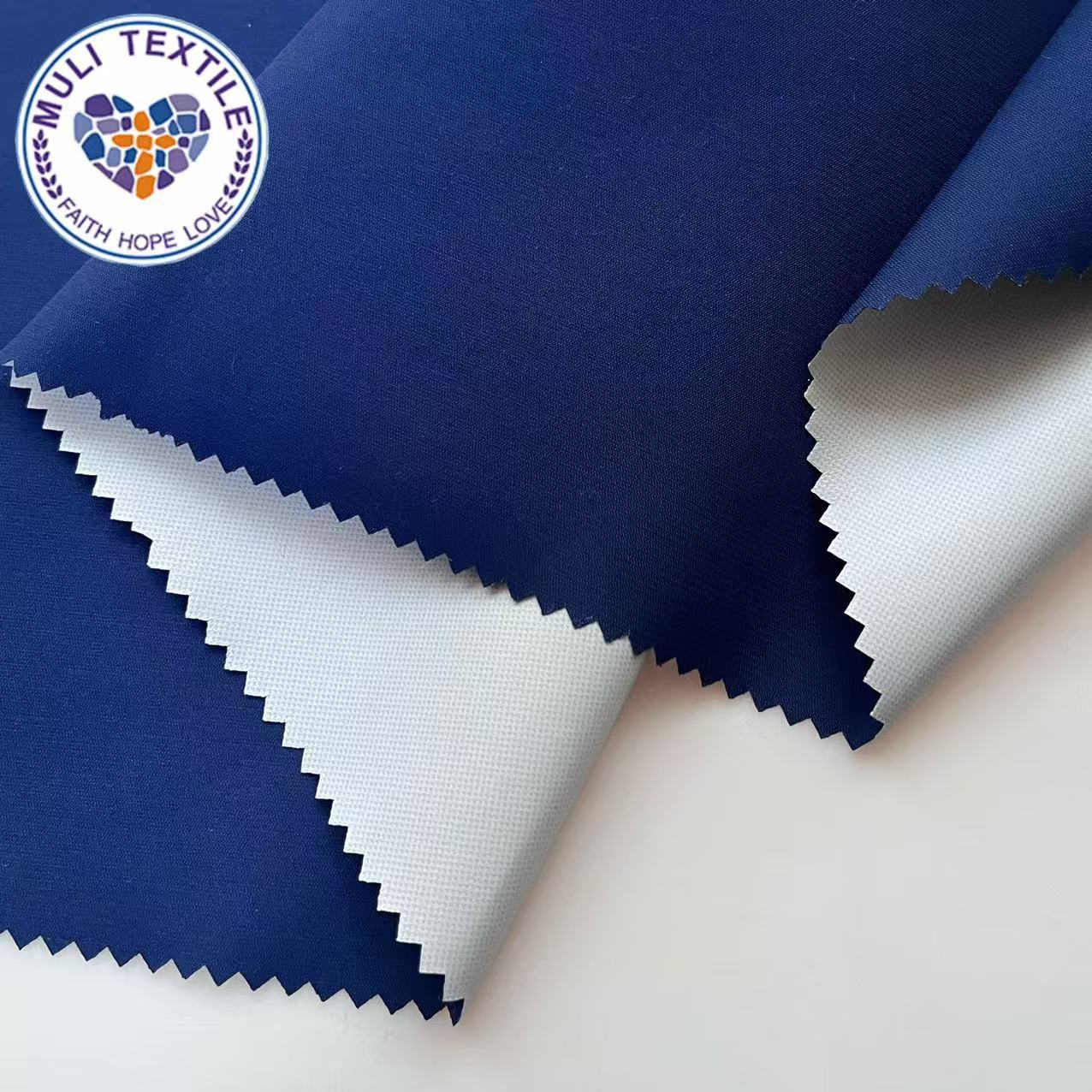 定制破卡复合乳白膜PU涂层校服面料防水布料冲锋衣夹克防寒保暖