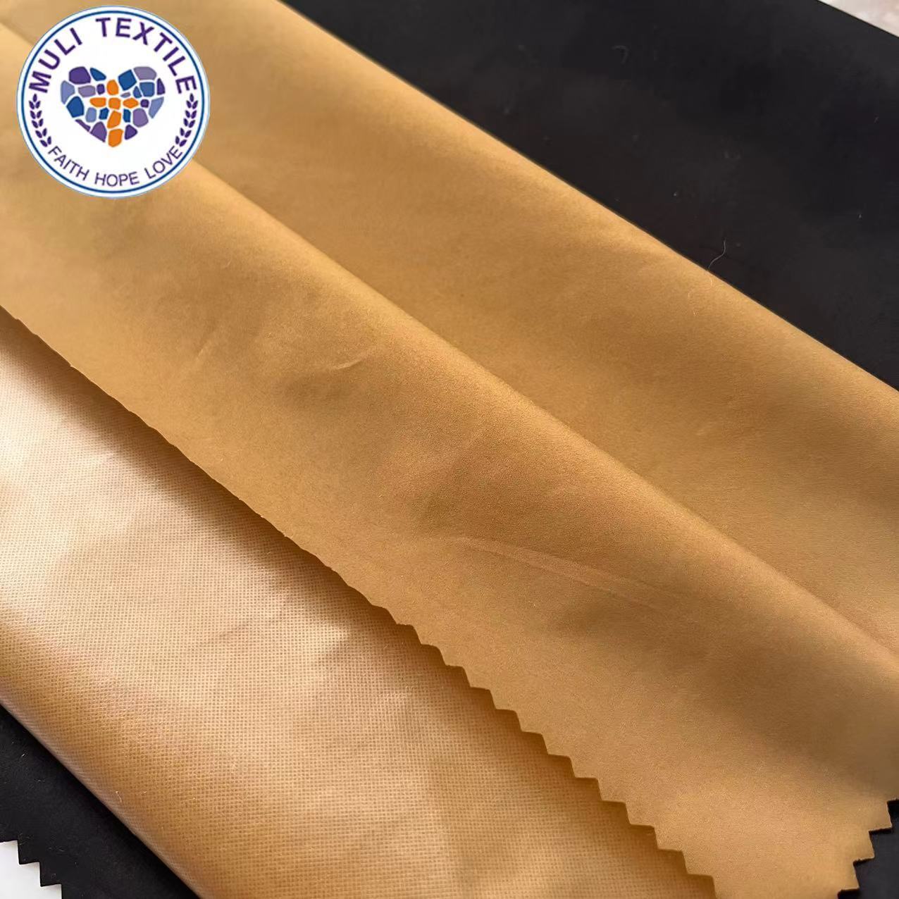 400春亚纺三防超厚贴膜羽绒服冲锋衣面料涤纶布工装马甲染色布