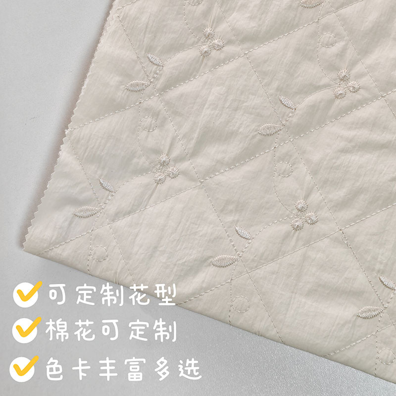 定制绗缝夹棉布料绣花布绗缝夹棉包面料服装面料箱包布尼龙皱夹棉