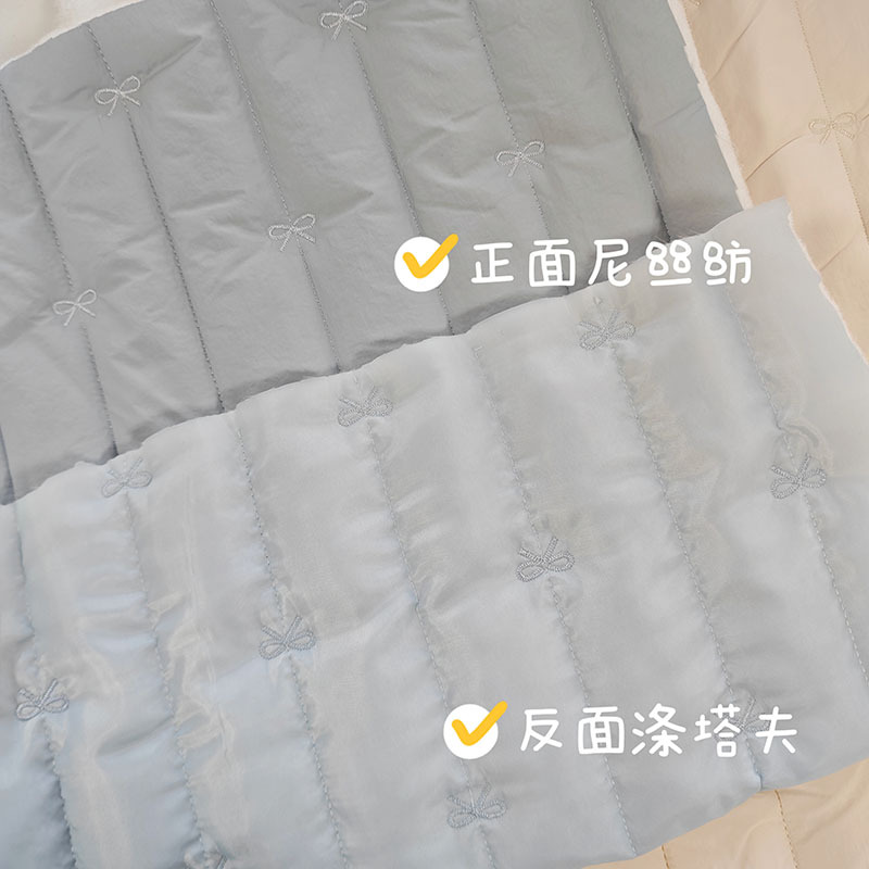 竖条绗缝加蝴蝶结刺绣绗缝棉布料韩国衍缝棉布料化妆包包棉