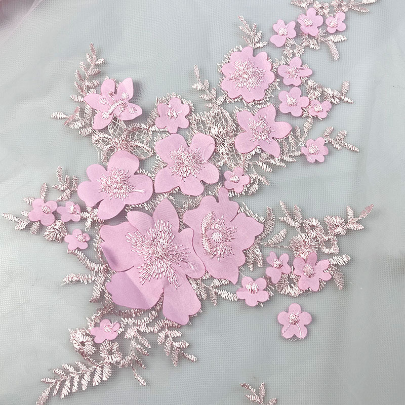 定制2025年春夏新款绣花面料激光绣花刺绣布连衣裙童装面料舞台服