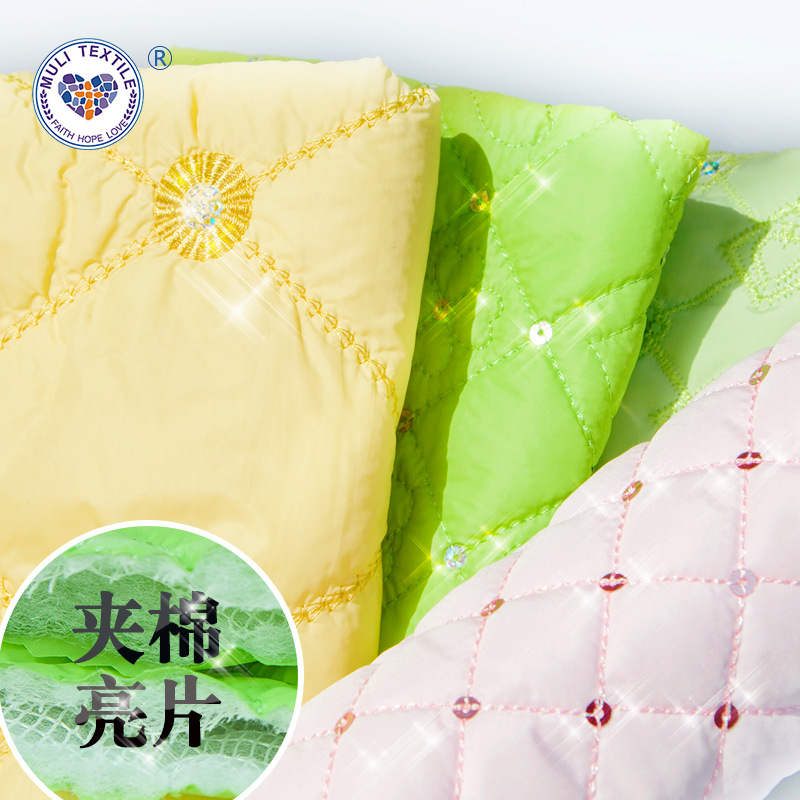 亮片夹棉绗缝布料 棉服刺绣面料电脑绣花厂 羽绒服面料绗绣批发