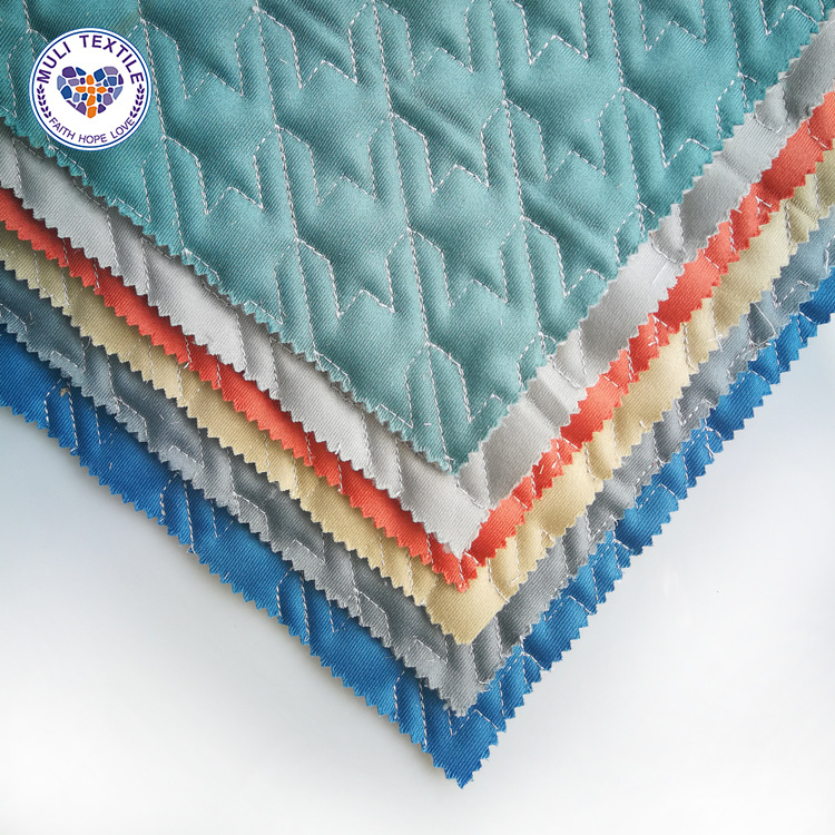 工厂直销 荷兰绒 千鸟格绗缝夹棉 防滑 烤火罩 沙发垫布料批发