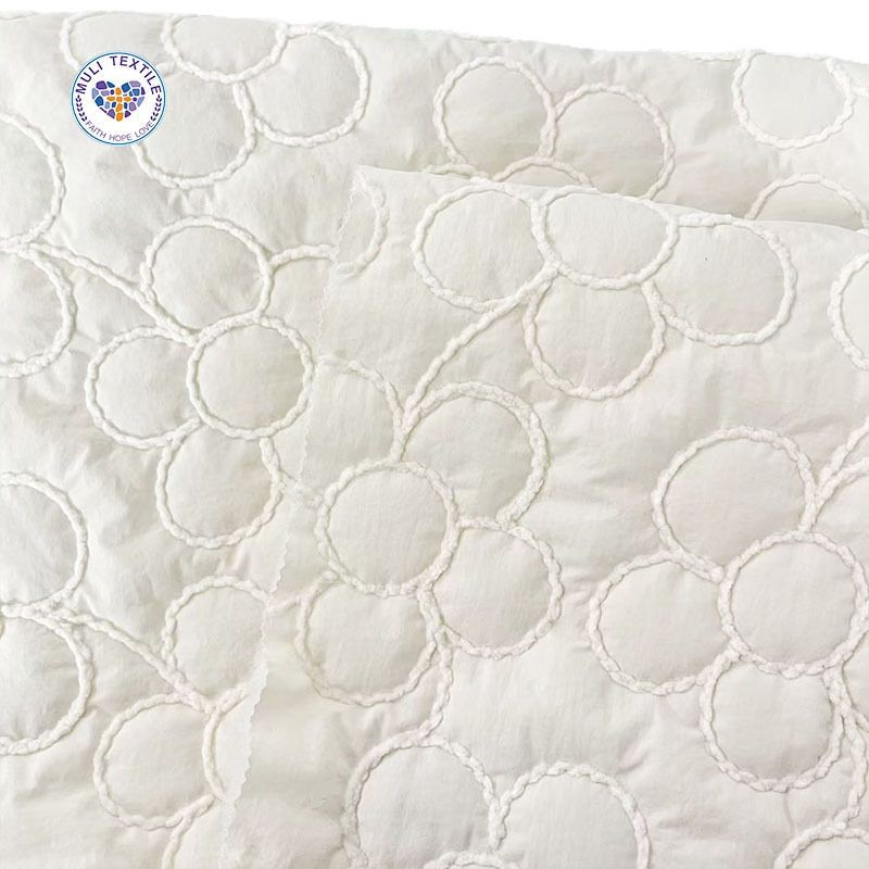 定制新品花朵绳绣夹棉绗缝包面料立体绣花家居布料夹喷胶棉涤棉布